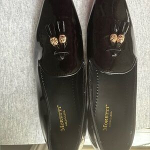 Elegant Black and Gold Slip-On Loafers